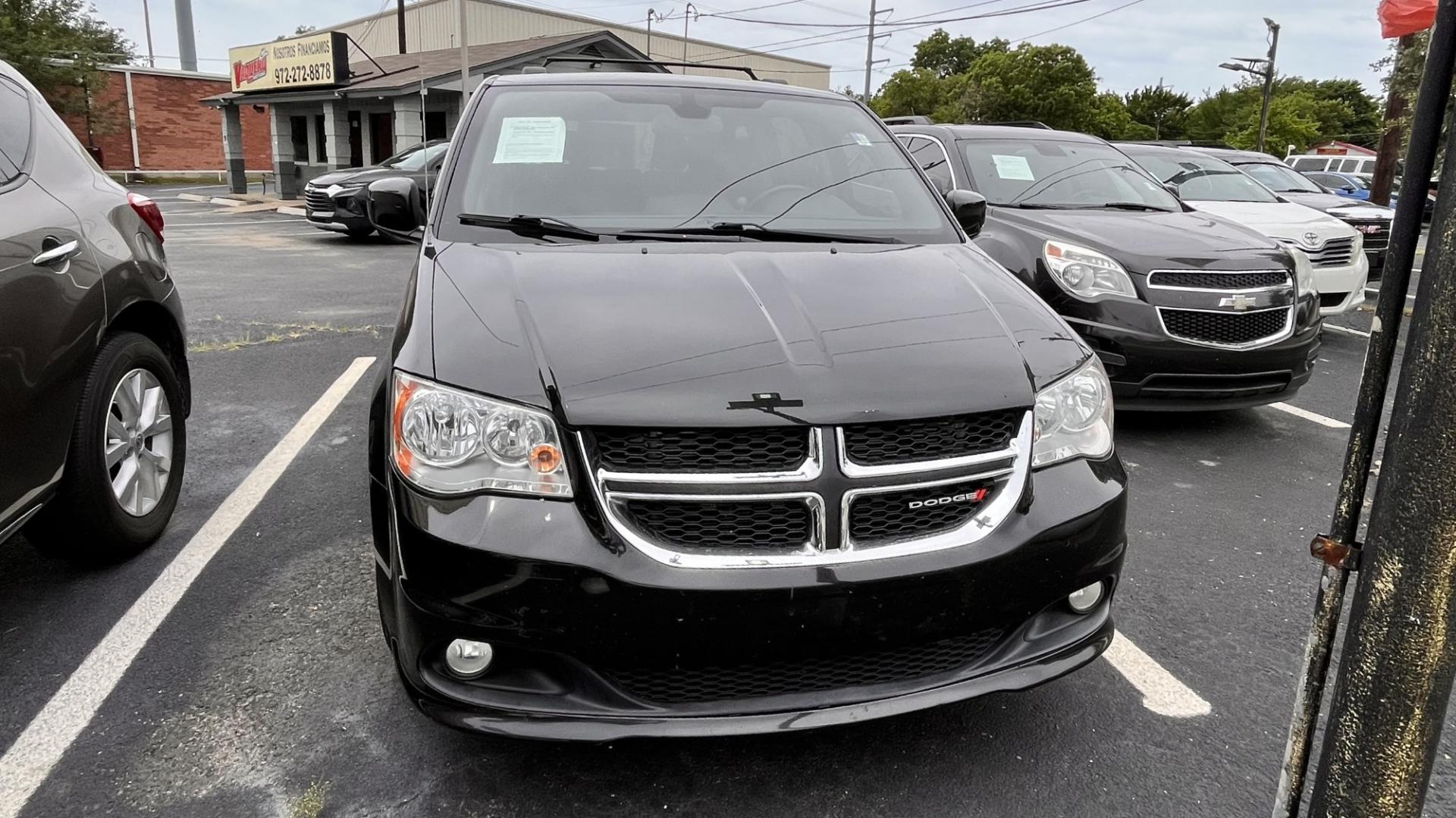 2018 Black Dodge Grand Caravan (2C4RDGCG9JR) , located at 945 E. Jefferson Blvd, Dallas, TX, 75203, (214) 943-7777, 32.752514, -96.811630 - Photo#1